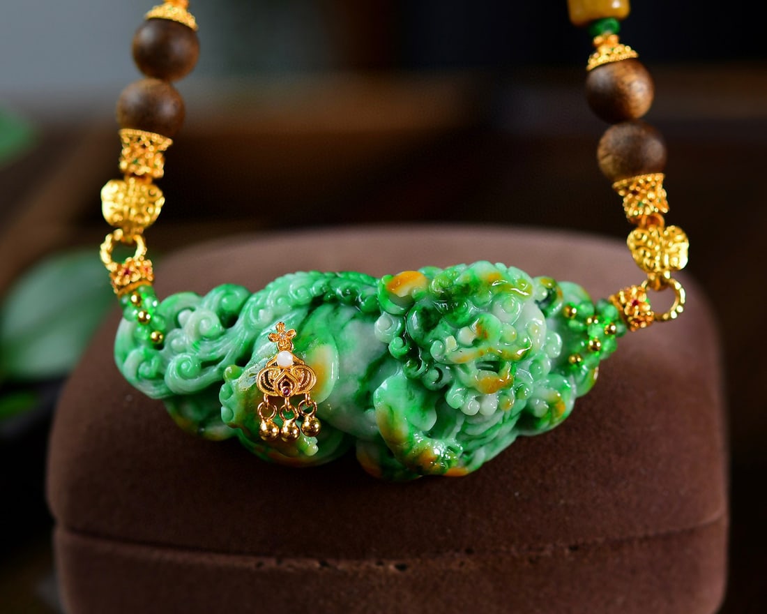 Yellow Green Jadeite Hand-carved Pendant - Lion: Title: Yellow Green Jadeite Hand-carved Pendant - Lion Origin: Chinese Date/Period: After2020 Materials: Jadeite Dimensions: 61x26.5x13.7(mm) 2.40x1.04x0.54(inches) Reserve: $668.00 