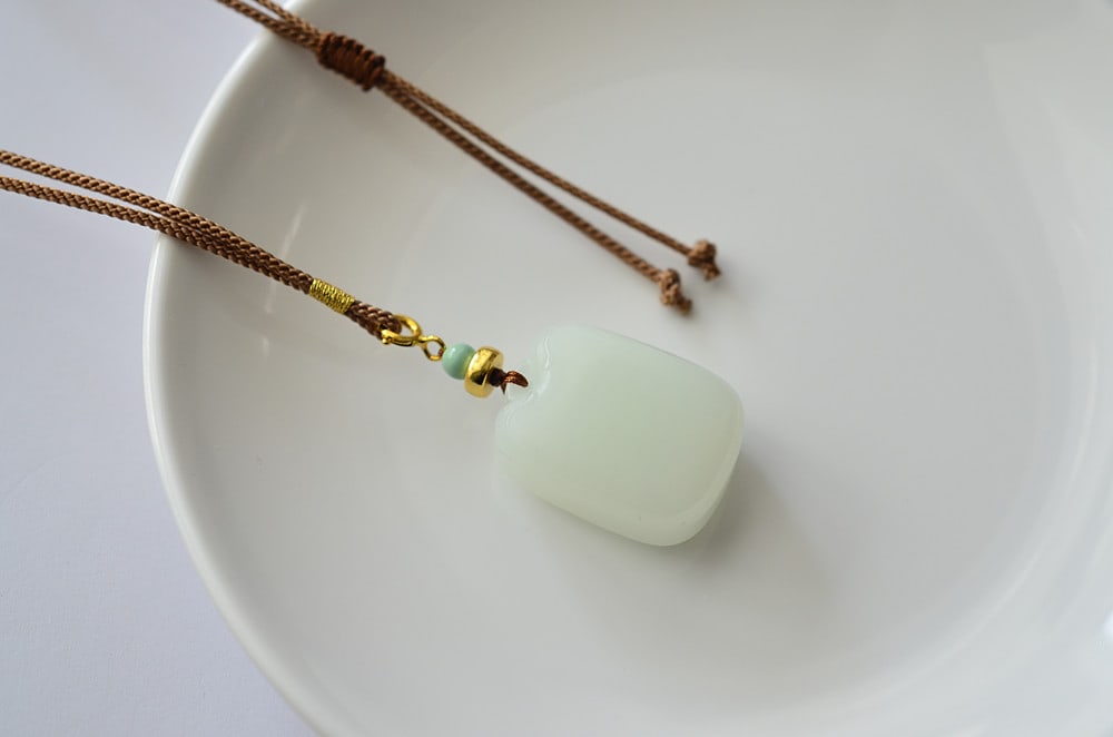 Natural Hetian Jade Lucky Pendant with Certificate: Title: Natural Hetian Jade Lucky Pendant with Certificate Origin: Chinese Date/Period: After2020 Materials: Hetian Jade Dimensions: 26.2x19.8x11.8(mm) 1.03x0.78x0.46(inches) Reserve: $399.00 Shipping: