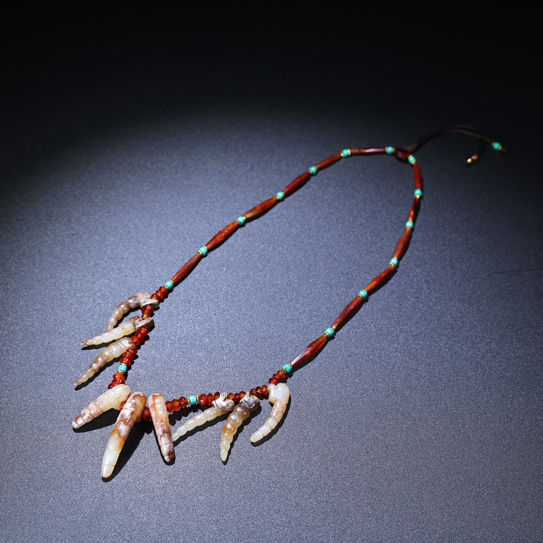 Hand knitting Agate,Turquoise,Hetian Jade Silkworm Necklace: Title: Hand knitting Agate,Turquoise,Hetian Jade Silkworm Necklace Origin: Chinese Date/Period: After1890 Materials: Agate,Turquoise,Hetian Jade Dimensions: 27x5(mm) 1.06x0.20(inches) 47x9x15(mm)