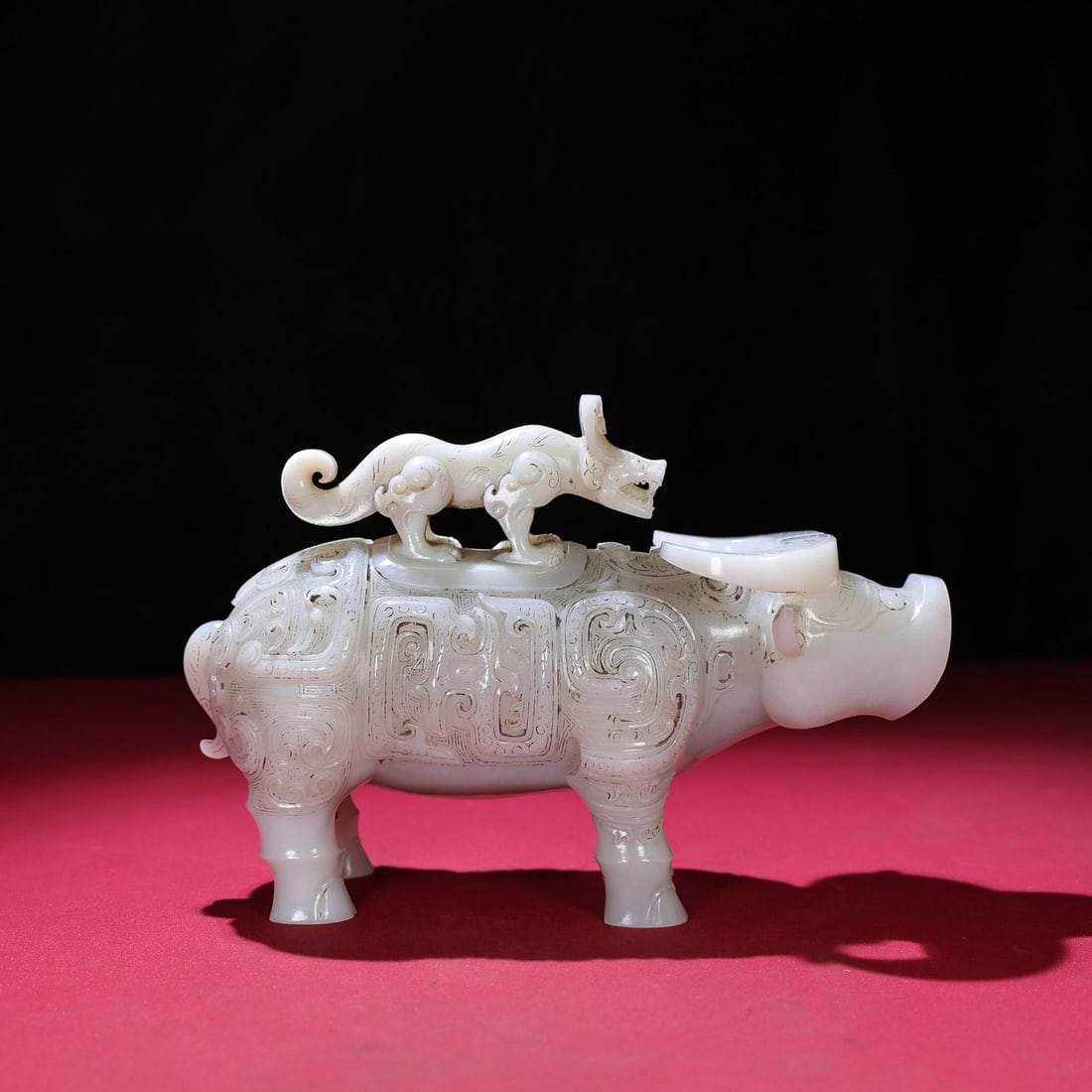White Hetian Jade Hand-Carved Animal Statue w Fortune Ox(Zun vessel in the shape of a bull): Title: White Hetian Jade Hand-Carved Animal Statue w Fortune Ox(Zun vessel in the shape of a bull) Origin: Chinese Date/Period: After1800 Materials: Hetian Jade Dimensions: 200x80x137(mm)