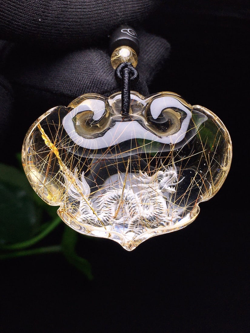 Crystal Hand-Carved Dragon Pendant: Title: Crystal Hand-Carved Dragon Pendant Origin: Chinese Date/Period: After2025 Materials: Crystal Dimensions: 47x36x20(mm) 1.85x1.42x0.79(inches) Weight 0.10 lbs/45.2g Reserve: $199.00 