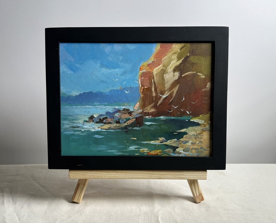 Oil painting Rocky seashore Yuriy Suprunchuk: Title: Oil painting Rocky seashore Yuriy Suprunchuk Description: №AAA4150 This oil painting titled "Rocky Seashore," captures the dramatic beauty of a rugged coastline with its interplay of ligh