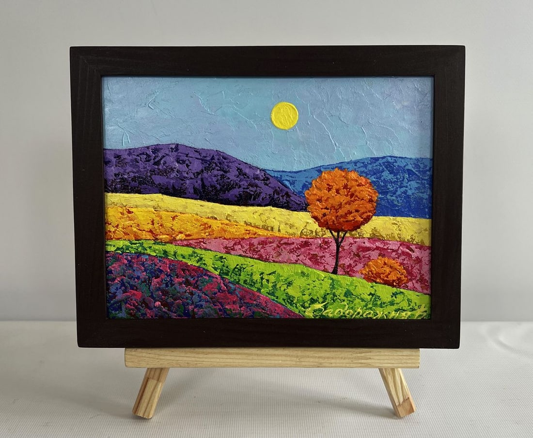 Oil painting A lonely tree in a field V. Zadorozhnya: Title: Oil painting A lonely tree in a field V. Zadorozhnya Description: №AAA4558 The painting "A Lonely Tree in a Field" captures the quiet solitude of a singular tree standing amidst rolling h