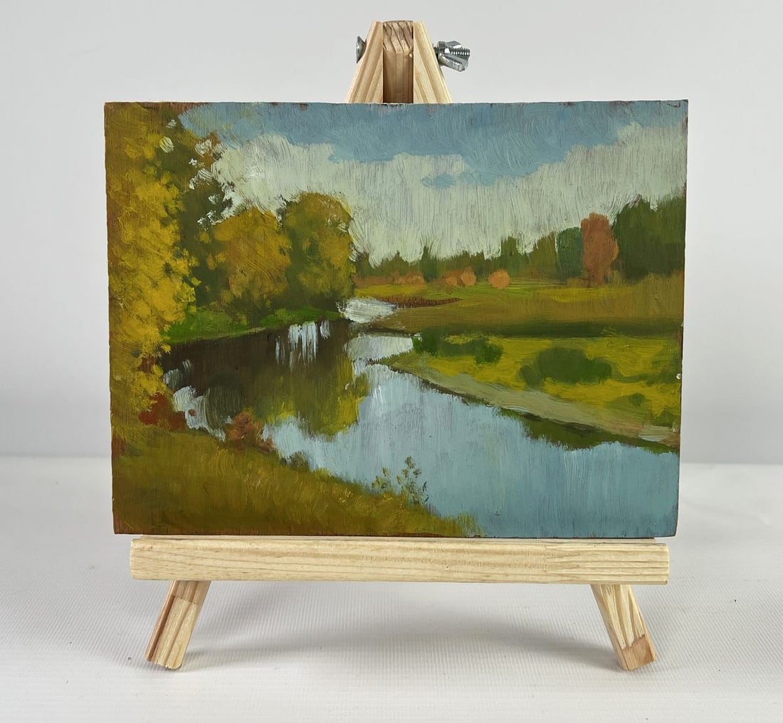 Oil painting Autumn landscape with a river view Mykhailo Burdylo: Title: Oil painting Autumn landscape with a river view Mykhailo Burdylo Description: №AAA5046 The oil painting on wood titled "Autumn landscape with a river view" captures the serene beauty of a