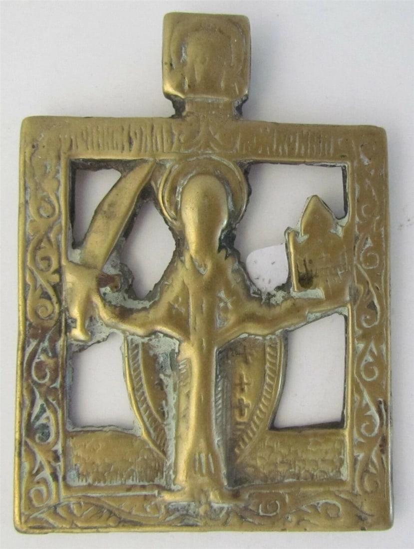 RUSSIAN BRONZE ICON of ST. NICHOLAS of MOZHAISK 17th CENTURY ANTIQUE: RUSSIAN BRONZE ICON of ST. NICHOLAS of MOZHAISK 17th CENTURY ANTIQUE Pierced scrolling foliage border, and inscription across the top Size 2 1/4 by 3" Wear Reserve: $209.00 Shipping:Domestic: