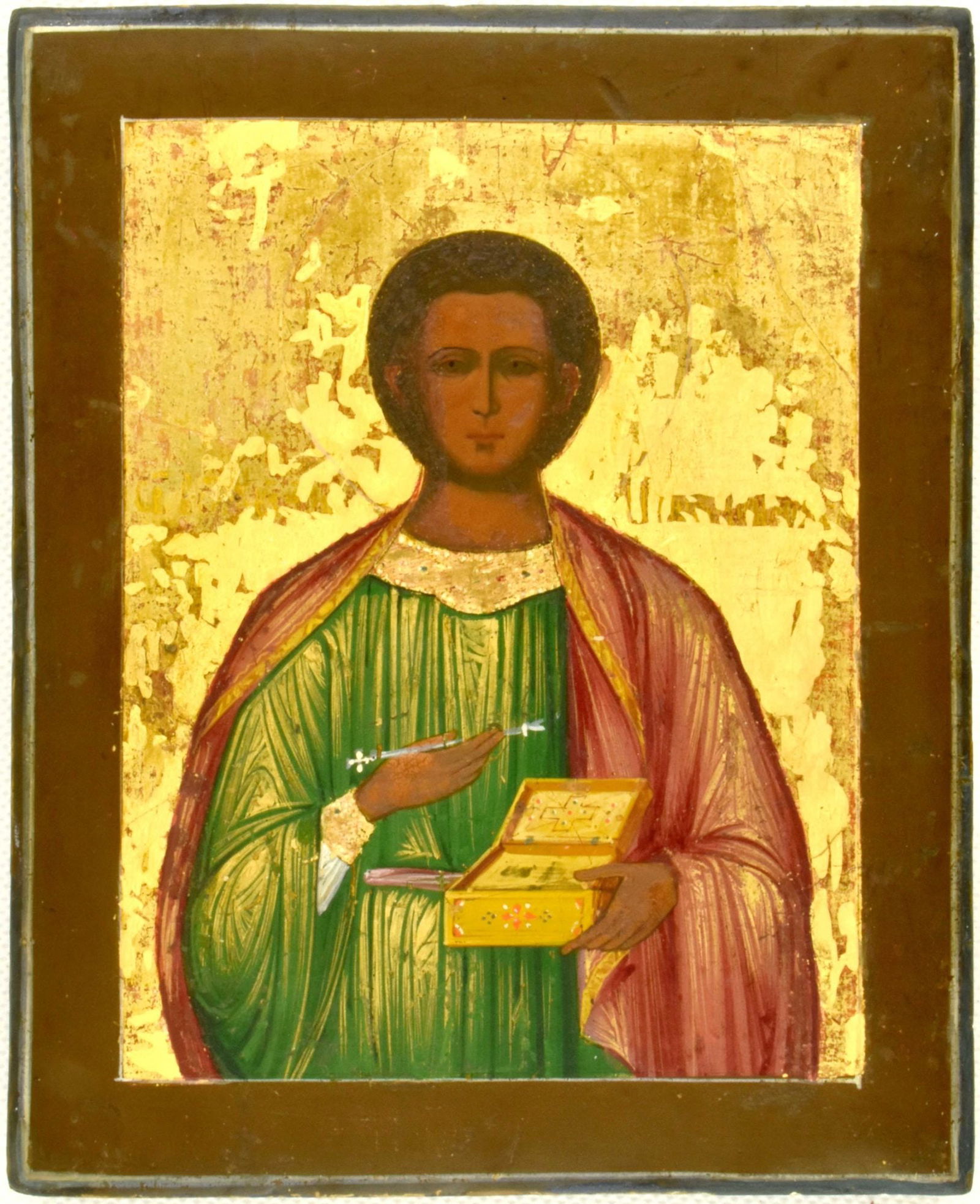 Saint Panteleimon the All-Merciful: Description: Saint Panteleimon the All-Merciful. Russian wooden medical icon.Details: Dimensions 14.1 × 17.8 cm Century 19 Reserve: $50.00 Shipping:Domestic: Flat-rate of $600.00 to anywhere