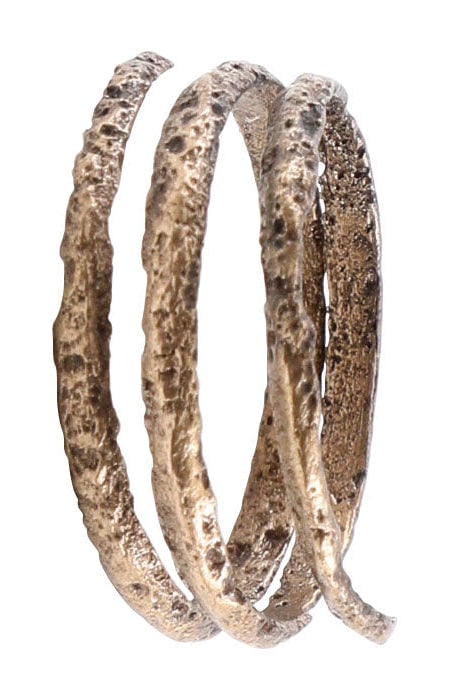 VIKING WARRIOR’S COIL RING, 10th CENTURY AD, SIZE 7 3/4: Gilt bronze, size 7 3/4. Rounded front, flat back section band in 2 1/2 full coils, to 5.35mm width, 1/4". The coil or helix was a favorite form for Vikings and evidently held supernatural significanc