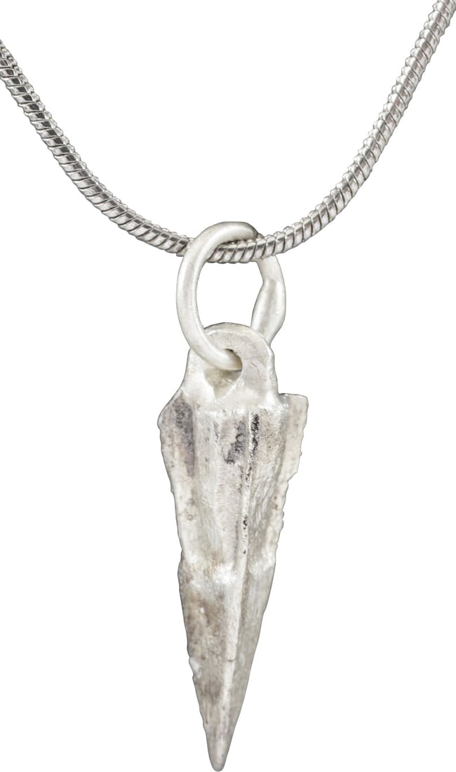 ROMAN ARROWHEAD PENDANT, 3RD-5TH CENTURY AD.: The period of the fall of Rome and loss of power to Germanic barbarians. Just over 3/4" in length plus the suspension loop. Usually lost on the battlefield and not often found in such good preservatio