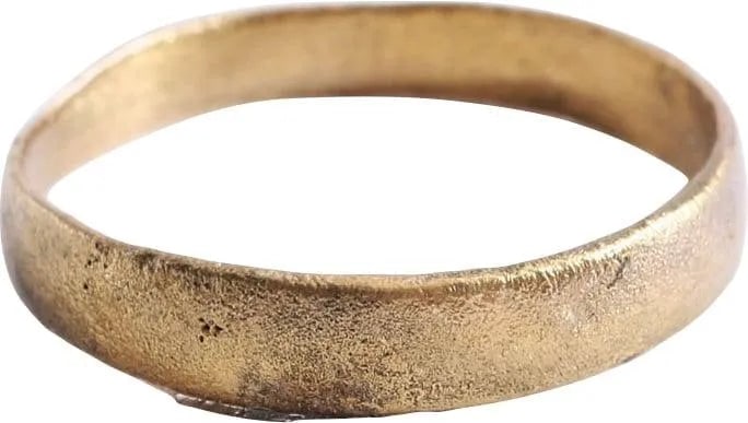 ANCIENT VIKING WOMAN’S WEDDING RING C.850-1050 AD SIZE 9 1/4: 3.5-4.2mm in width. Rounded face band. The surface is somewhat degraded from burial. Vikings exchanged rings on the pommel of the groom's sword. Rare large wearable size. Professionally refurbished wi