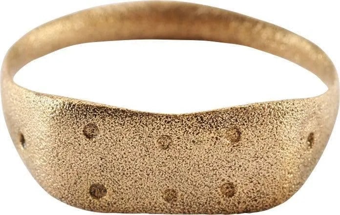 CHRISTIAN PILGRIM'S RING 6TH-9TH C.AD, SIZE 10: 2.7mm band flared to the shoulders. Rectangular bezel with two rows of three dots and one dot to each shoulder. That decoration was originally used in groups of five, representing the five wounds of C