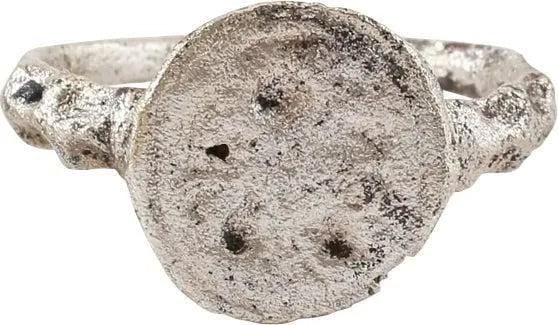 ANGLO SAXON RING 7th-10th CENTURY AD, SIZE 9 1/4: Gilt bronze, size 9 1/4 with circular bezel impressed with "cup or dot" motifs. 2.1mm rounded face band scalloped at the shoulders. See Ancient Rings, T N Pollio, p.42 for an example of this type foun