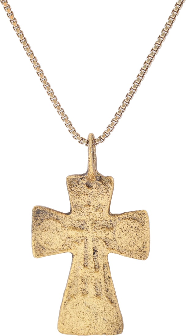 EASTERN EUROPEAN CROSS, 17TH-18TH CENTURY: Gilt bronze, just over 1” (1.05”) total height. The cross beam above center and both beams with flared terminals as with the Maltese Cross. The front with a vacant cross below the charges.