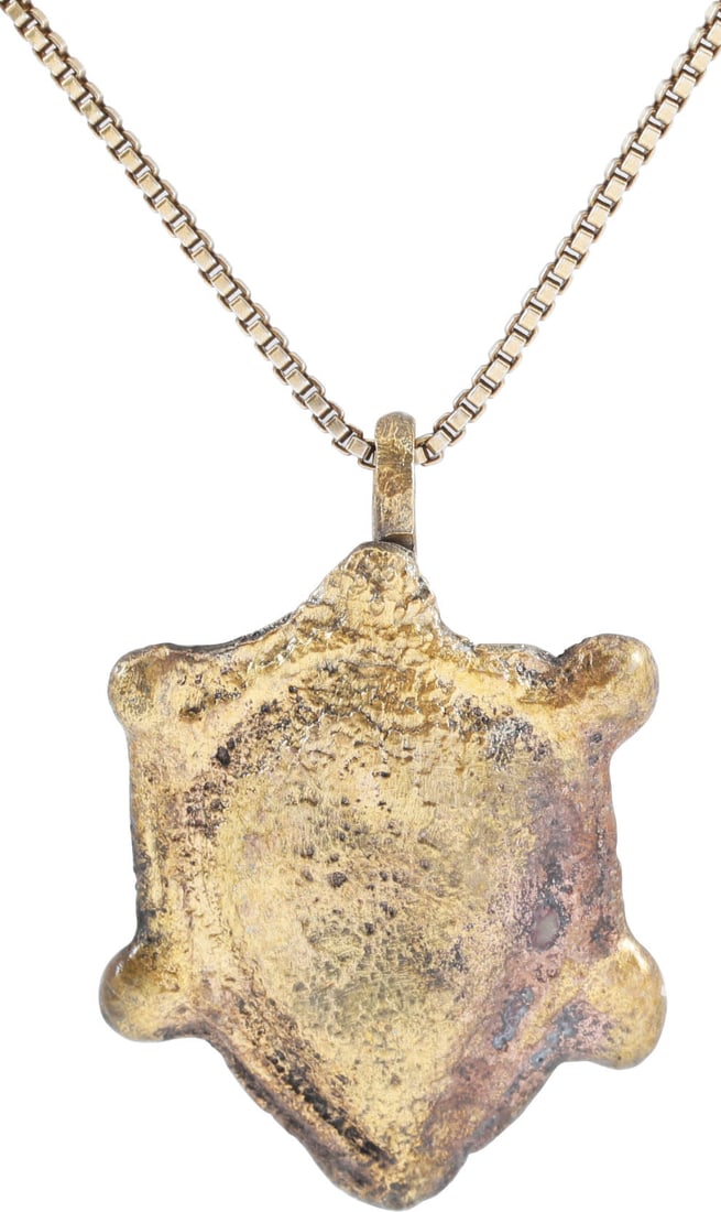 SCANDINAVIAN HEART PENDANT NECKLACE, 11TH-12TH CENTURY AD: The period of conversion to Christianity for Vikings. A remnant of the old pagan mythology in the form of an anatomically accurate heart, with raised border and nubs at the quarter points. A curious t