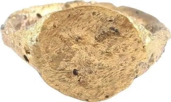 ENGLISH CHILD'S RING, 14th-15th C., UNDER SZ 1: Infant size, under size 1. Gilt bronze with narrowband flared at the shoulders. Oval bezel with three impressed motifs. Professionally refurbished with the gold overlay restored. From the burial of an