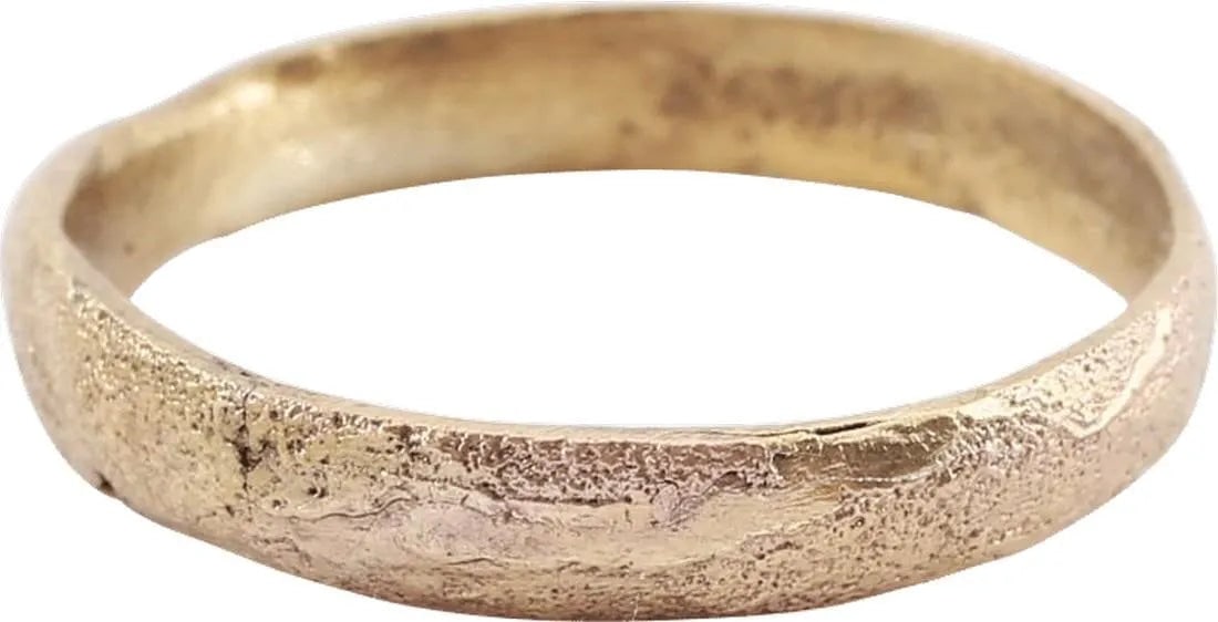 VIKING WARRIOR’S WEDDING RING, 9-10 CENT AD SIZE 10: 9th-10th Century AD. Gilt bronze. Size 10. 3.6mm with a rounded face. Surface textured from burial with a wonderful ancient look. Professionally refurbished with the 24karat gold surface restored. Rar