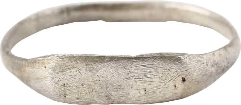 FINE VIKING MAN'S WEDDING RING, 9TH-10TH CENTURY, SZ 9 3/4: Silvered bronze, wearable size 9 3/4. Narrow band with a deeply rounded face, 2.2mm, flaring to a rectangular bezel. Professionally refurbished with the pure silver surface restored. See the reference