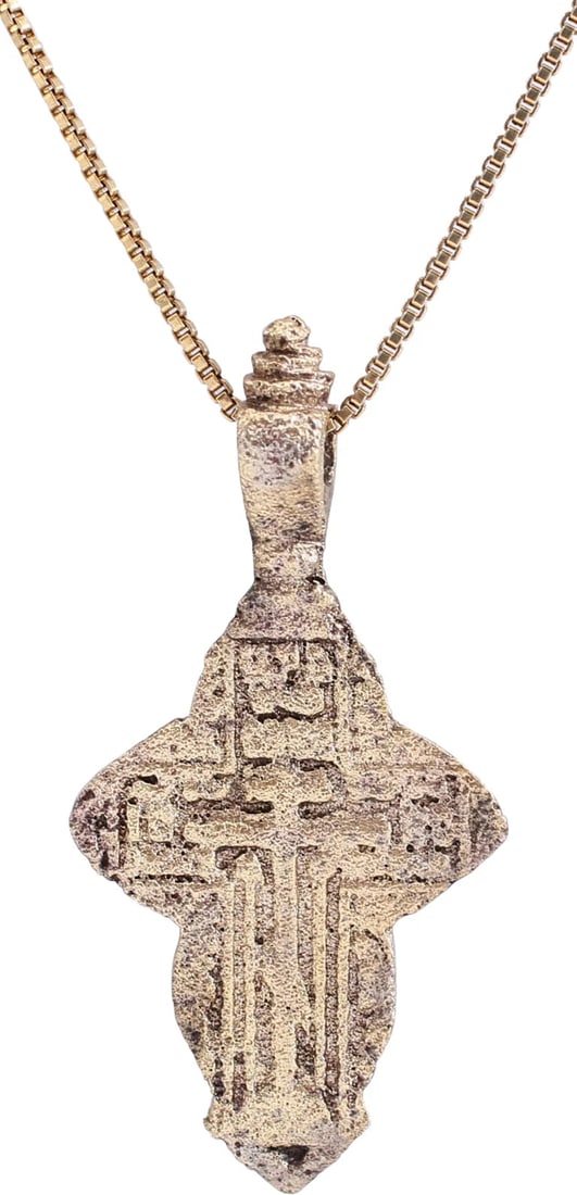 EASTERN EUROPEAN CHRISTIAN CROSS, 17TH-18TH CENTURY: Silvered bronze. Over 1 3/8" total height with elegant Baroque suspension loop. Flat border delineating the cross with broad beams, the cross beam above the center, and enclosing a stick cross with