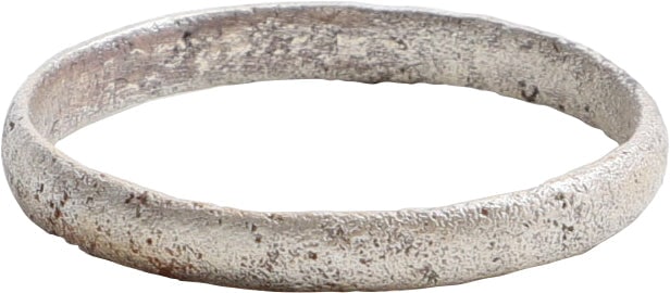 VIKING WEDDING RING, 850-1050 AD, SIZE 9 1/2: Late 9th-early 11th. Silvered bronze, size 9 1/2. 2.7mm band, with rounded face. Surface worn from its time of use and slightly textured from burial. Professionally refurbished with the pure silver ov