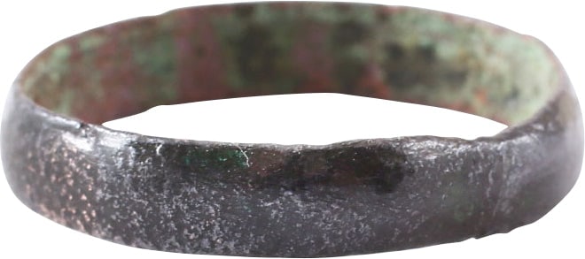 RARE COPPER VIKING WEDDING RING C.850-1050 AD, SZ 9 1/4: 4.1mm width rounded face band. Fine dark patina with red copper color on the edges. Vikings were expert metallurgists. The use of pure copper is rare and suggests a supernatural significance as alloys