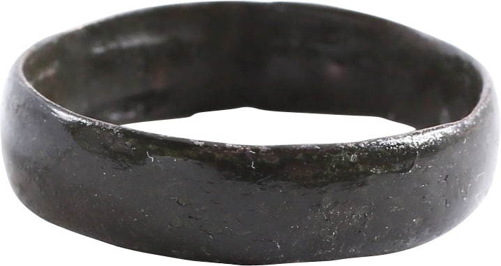 VIKING WEDDING RING, C.866-1067, SIZE 10 3/4: Danelaw England. Copper rich bronze, size 10 3/4, 6.1mm width rounded face band. Made with a core filling the inside which distributed the flowing metal and allowed for slower cooling. The core was th