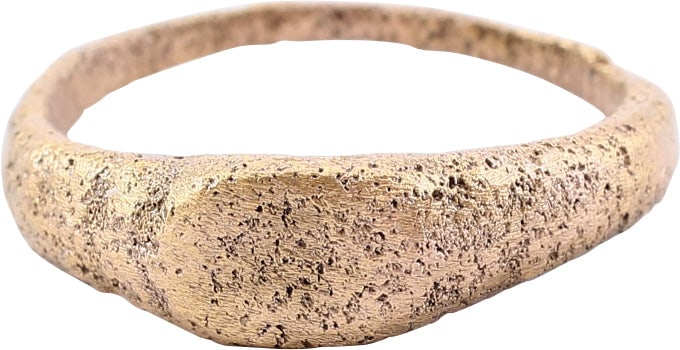 MEDIEVAL MAN'S RING C.13TH-15TH CENTURY AD, SIZE 10: Size 10-10 1/4. Robust form with 2.7mm deeply rounded face band dramatically expanding to the top. Raised oval bezel on stepped shoulders. Surface textured from burial. Professionally refurbished with