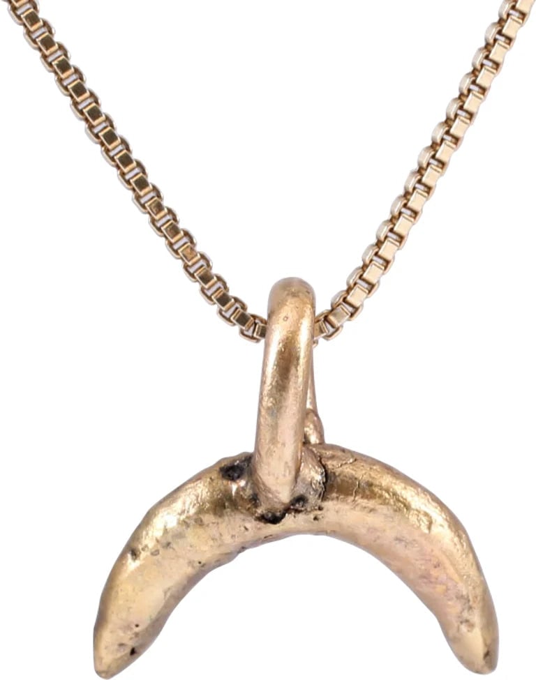 VIKING LUNAR PENDANT C.900-1000 AD: Just over ½" (0.53") width. As expert navigators, the constellations signified mystery and power to Vikings. The Moon was personified as Mani, brother to Sol the Sun, and is abundantly