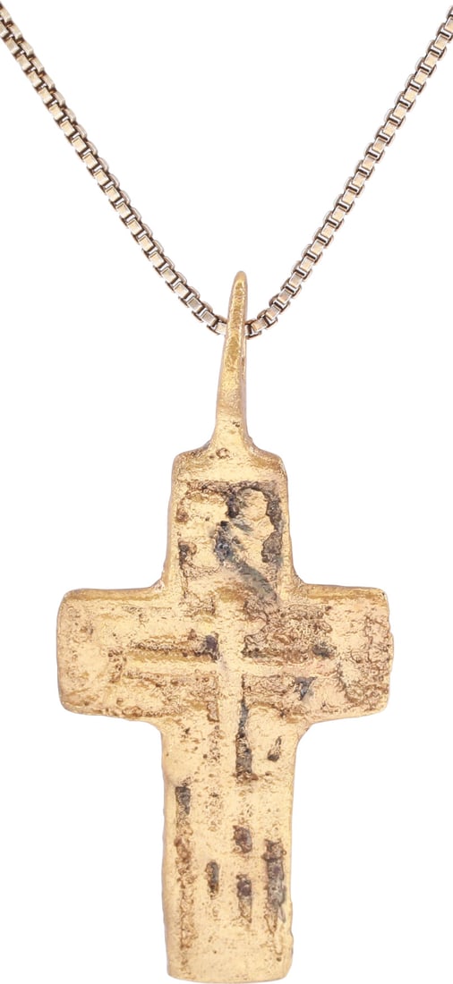 EASTERN EUROPEAN CHRISTIAN CROSS NECKLACE: 17th-18th century, Polish, Russian or Ukrainian. Orthodox rite. Gilt bronze, over 1 3/8” (1.39”) height with raised edges. Relief decoration of a vacant cross with charges and foot rest