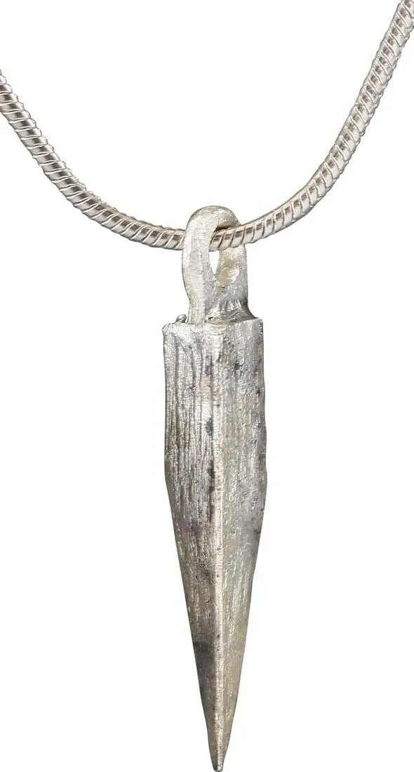 ANCIENT GREEK ARROWHEAD PENDANT NECKLACE: Bronze, just over 7/8" in length plus the loop. Well made with tapered triangular socket and elongated pyramidal form point. The crisp condition with the edges showing distinct sharpening marks.