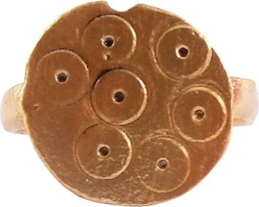 CHRISTIAN PILGRIM'S RING 6TH-9TH C. AD, SIZE 6 1/2: Size 6 1/2. 3.1mm band with rounded face. Large circular bezel with seven circle cluster. That decoration was originally used in groups of five, representing the five wounds of Christ. In time, its si