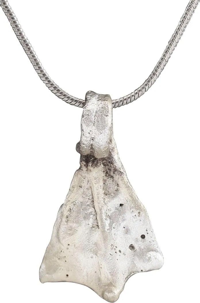 VIKING SORCERER'S AMULET NECKLACE 10TH-11TH CENTURY AD: Just over 1” height. Bronze shaped like a duck's foot and intricately detailed with raised toes well delineated. A burial at Viden, Denmark contained the body of a woman of wealth and status