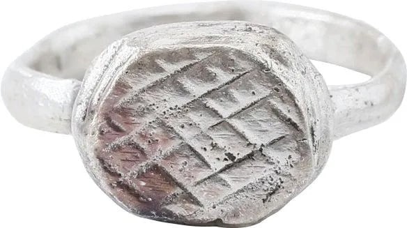 MEDIEVAL SIGNET RING 8th-11th CENTURY AD, SIZE 7: Period of the universal Christian conversion and the early Crusades. Size 7 with broad (3.1mm) rounded face band with slightly thickened bottom in the Roman taste. Faceted oval bezel cut with a