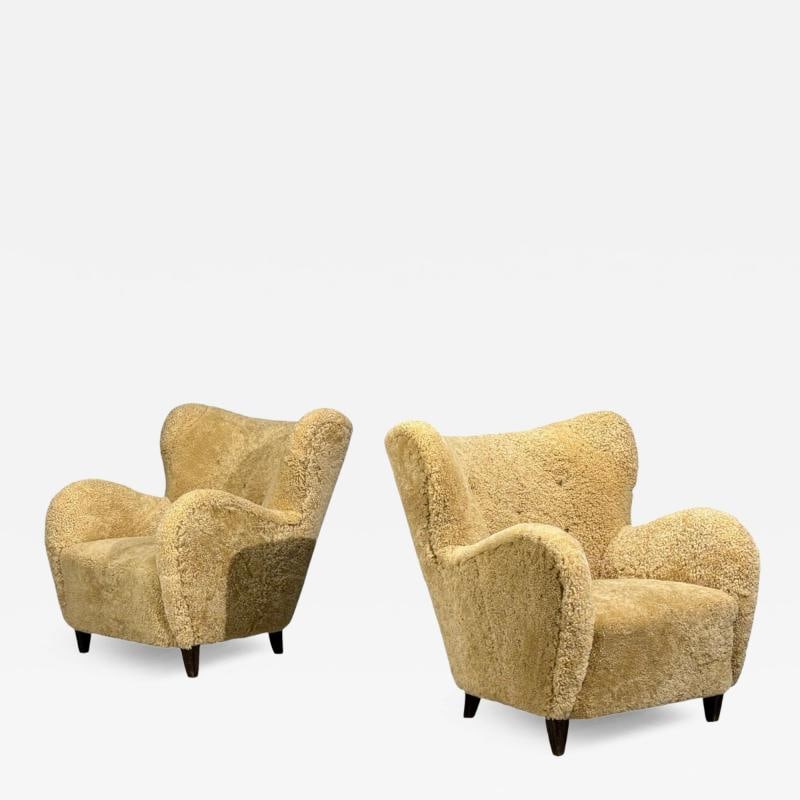Swedish Modern, Organic Lounge Chairs, Shearling, Wood, Sweden, 1940s: Title: Swedish Modern, Organic Lounge Chairs, Shearling, Wood, Sweden, 1940s Description: Sweden Mid-Century Modern, Organic Lounge Chairs, Honey Sheepskin, Wood, Sweden, 1940s Pair of beautiful organ