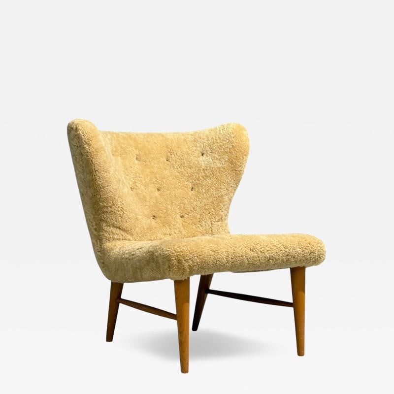 Erik Bertil Karlén, Rare Easy Chair, Beech, Shearling, Sweden, 1940s: Title: Erik Bertil Karlén, Rare Easy Chair, Beech, Shearling, Sweden, 1940s Description: Erik Bertil Karlén, Swedish Mid-Century Modern, Easy Chair, Beech, Sheepskin, Sweden, 1940s A gorgeou