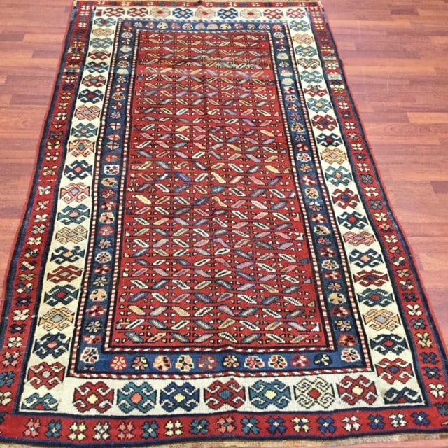 Antique kazak caucasin Rug-1752: Title:Antique kazak caucasin Rug-1752Description:Charming antique Kazak Caucasian rug, from northwest Caucasus , size 4 ft by 7 ft, circa 1900. The Large X design covered the entire red field of this