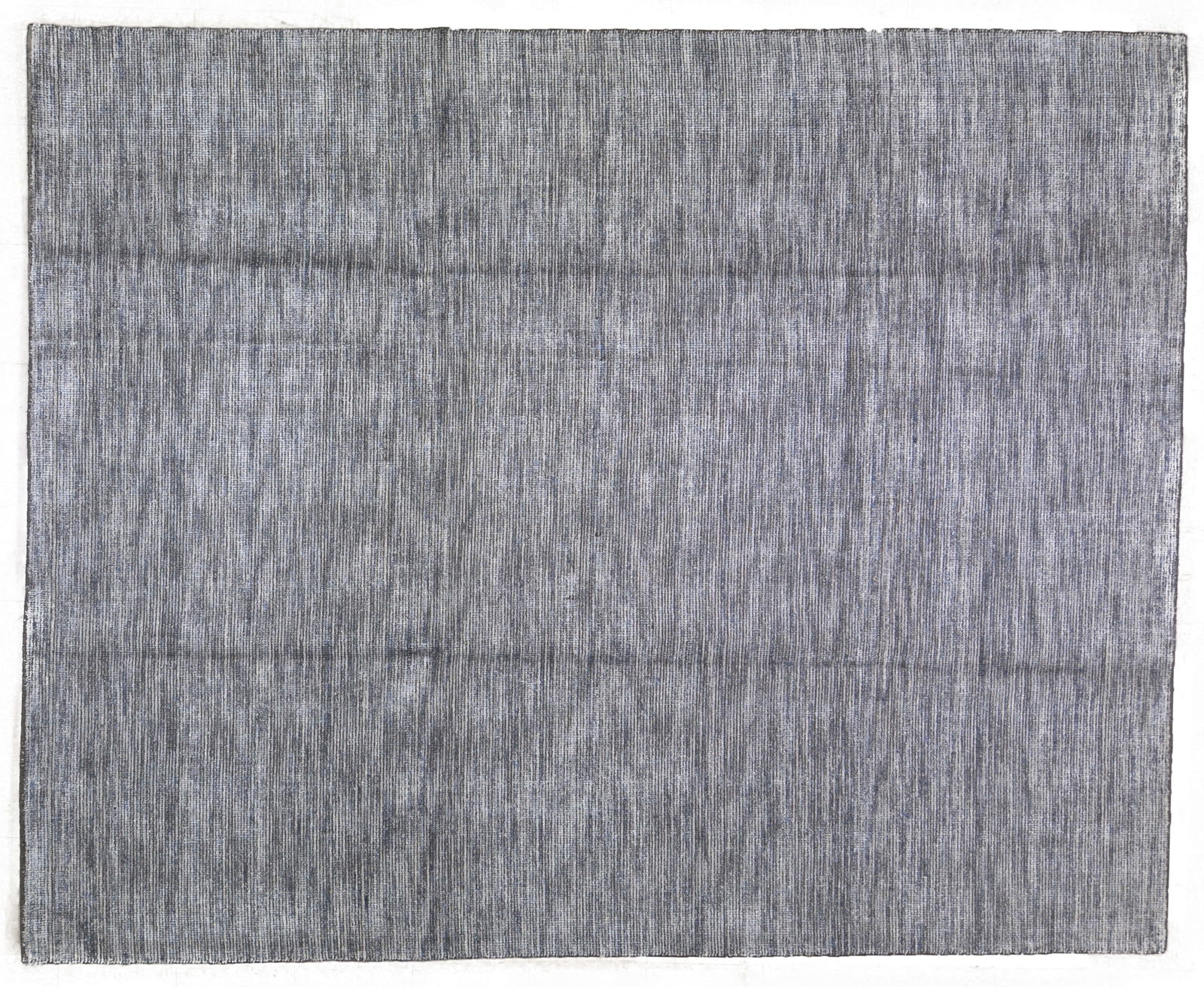 INDIAN HAND KNOTTED WOOL/BAMBOO RUG: Title: INDIAN HAND KNOTTED WOOL/BAMBOO RUG Size: 8X10 Age: NEW Origin: INDIAN Style: MODERN HANDLOOM Material: WOOL/BAMBOO Care: PROFESSIONAL Structure: HAND KNOTTED Design: MODERN Reserve: $400.00