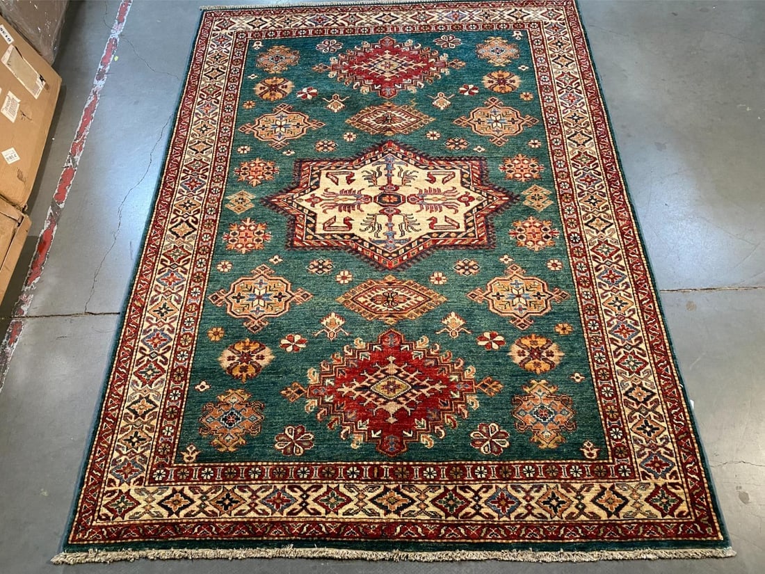 MAGNIFICENT SUPER KAZAK RUG 5' X6'.9": Title:MAGNIFICENT SUPER KAZAK RUG 5' X6'.9"Description:5' X6'.9" Super quality Kazak Rug, hand spun and hand knotted rug in Pakistan 100% natural Vegge Dye wool with beautiful sheen pile, in Green,