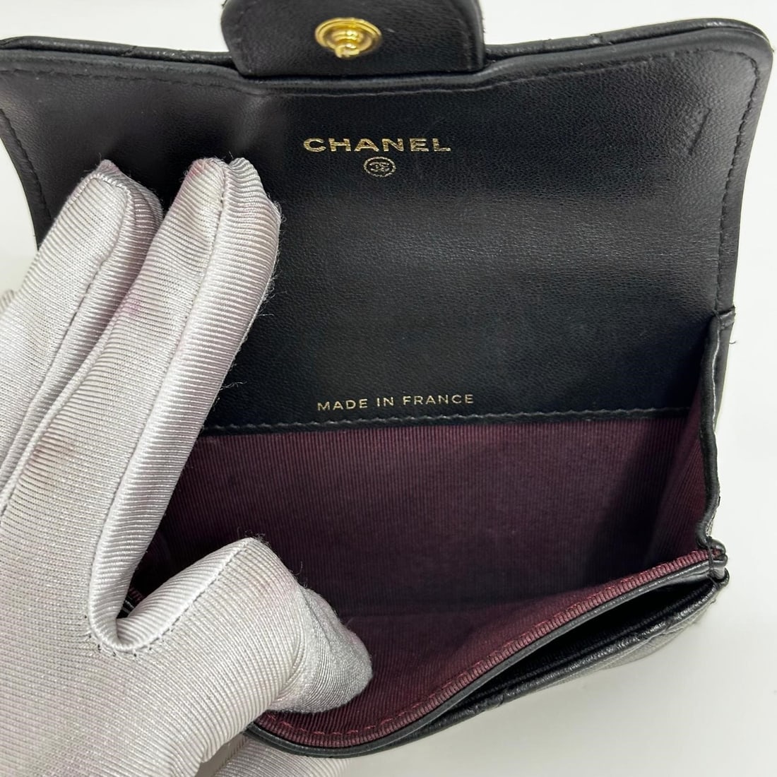 CHANEL Black Quilted Leather Card Holder with Gold Logo - 8