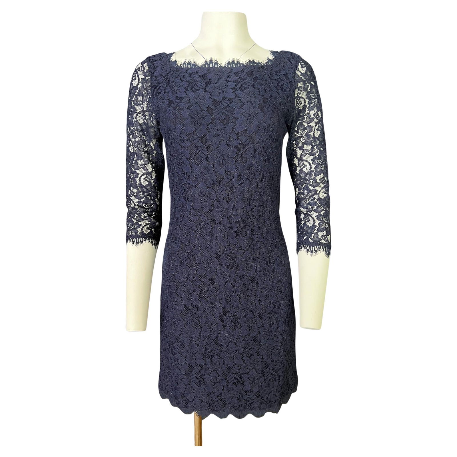 Diane von Fürstenberg Navy Lace Mini Dress, Size 8: Floral lace motif Gold tone rear zip closure 3/4 sleeves length Crew neckline on the front and v neckline on the back Reserve: $440.00 Shipping:Domestic: Flat-rate of $85.99 to anywhere