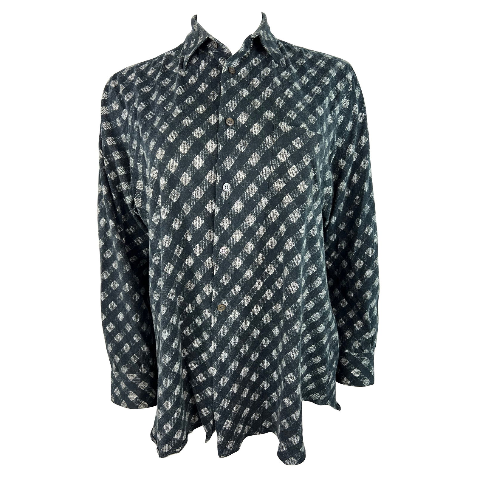 Vintage Comme des Garcons Shirt Black and White Cotton Shirt Top, Size XL: Product details: The shirt features black and white pattern design, front button closure and side pocket detail. Made in France. Reserve: $232.00 Shipping: Domestic: Flat-rate of $85.99 to a