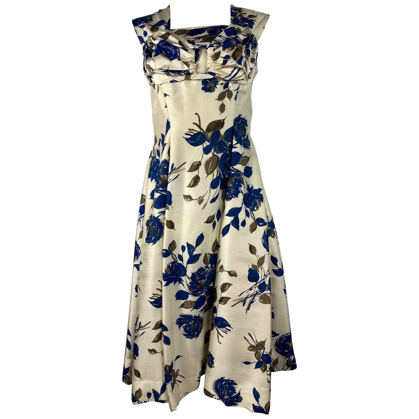 Vintage Marwi Cream and Navy Floral Sleeveless Dress, Size 40: Product details: The dress features no sleeves with straps, rear zip closure, flare skirt design and mid length. Reserve: $440.00 Shipping:Domestic: Flat-rate of $85.99 to anywhere within