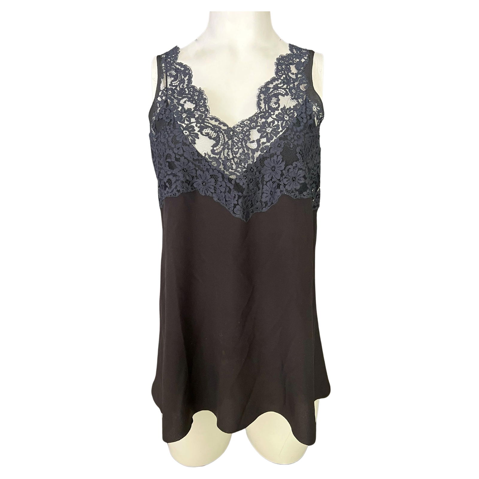 Chloe Navy and Black Tank Top Blouse, Size 38: Sleeveless Featuring black slick with navy lace detail Includes black cami top with spaghetti straps V neckline Reserve: $360.00 Shipping:Domestic: Flat-rate of $85.99 to anywhere within