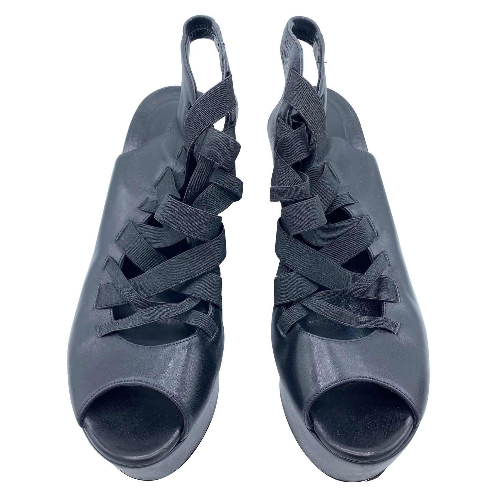 Georgina Goodman Black Leather Platform Shoes: Product details: The shoes feature black leather, open toe, the platform measures 5" high. Reserve: $480.00 Shipping: Domestic: Flat-rate of $85.99 to anywhere within the contiguous U.S. Int