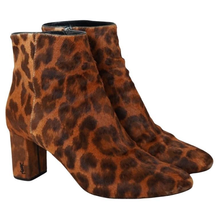 YSL pony-style calf skin leopard boots size 38.5: YSL pony-style calf skin leopard boots size 38.5 Heel Height 2.75 Has some wear to the front toe of the shoe Reserve: $320.00 Shipping:Domestic: Flat-rate of $85.99 to anywhere within the
