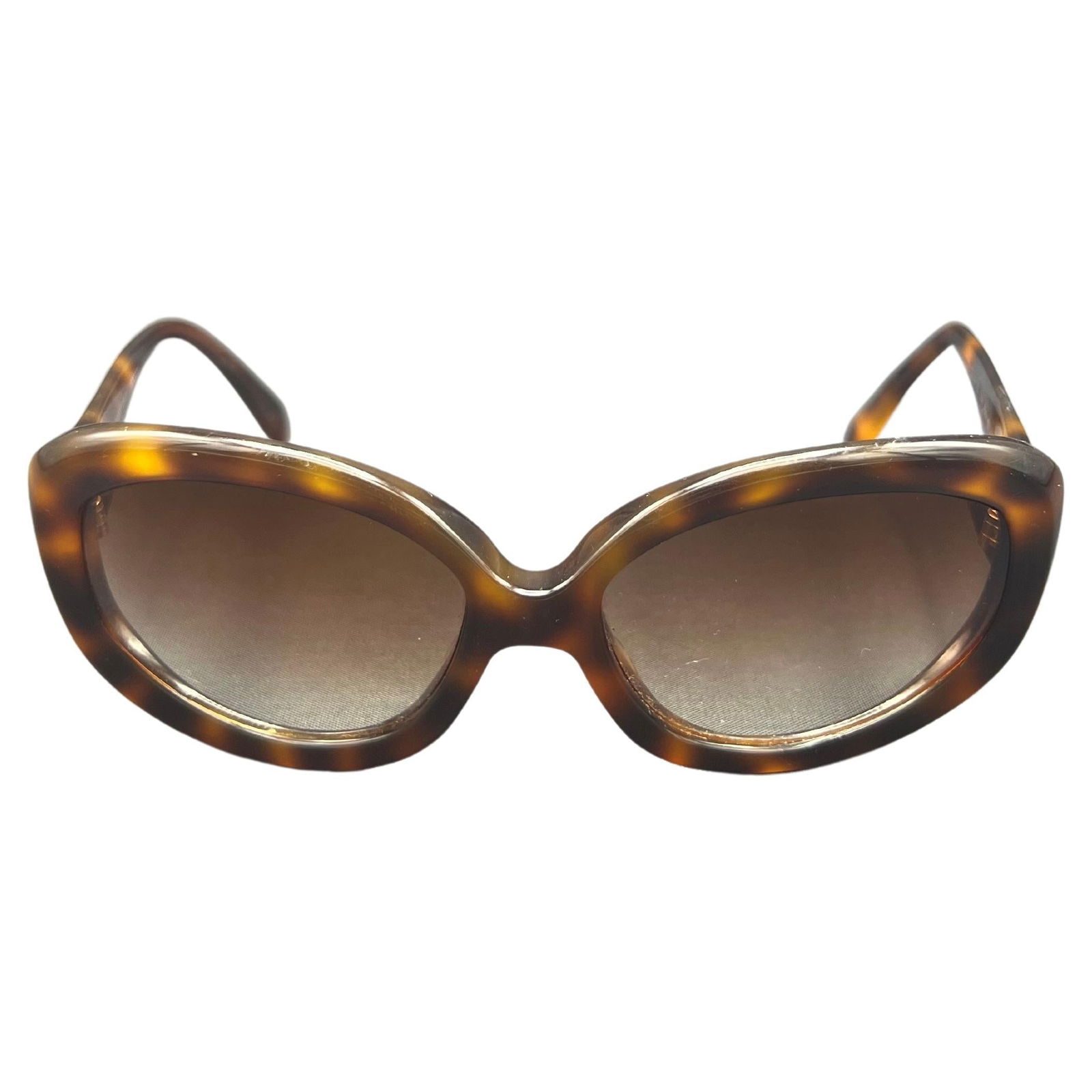 Oliver Peoples Twenty Years Paramount Limited Edition Brown Oval Sunglasses: Tortoise Frame Brown gradient lenses Oval/ round shape Comes with the original case Reserve: $232.00 Shipping:Domestic: Flat-rate of $85.99 to anywhere within the contiguous