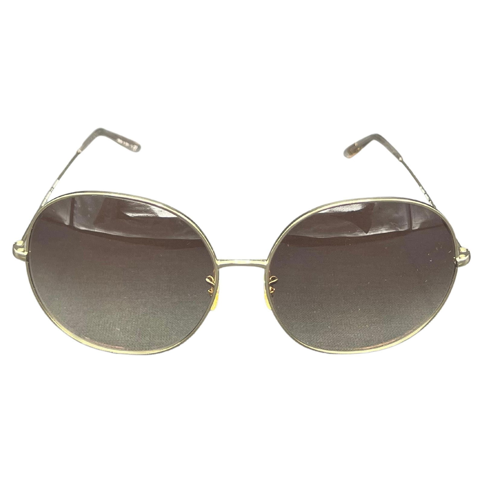 Oliver Peoples Darien Brown Round Sunglasses w/ Case: Gold tone hardware Brown gradient lenses Round shape Comes with the original case Made in Italy Reserve: $392.00 Shipping: Domestic: Flat-rate of $85.99 to anywhere within the contiguous U.S