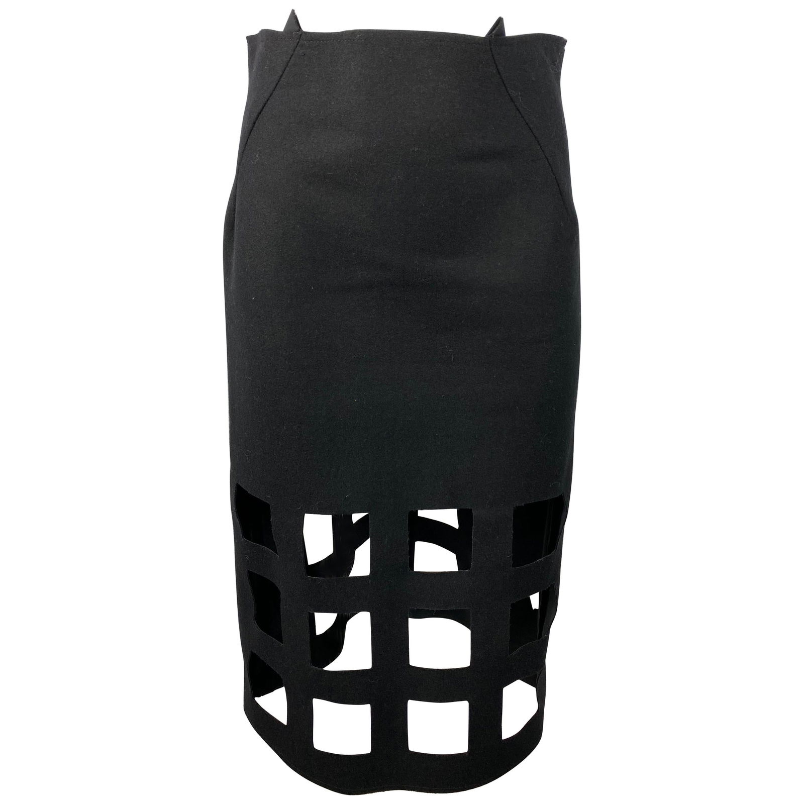 Nancy Stella Soto Black Wool Skirt, Size Medium: Product details: Black wool skirt in medium size designed by Nancy Stella Soto in the United States. The skirt features pencil style with geometric square cut out design on the bottom and concealed