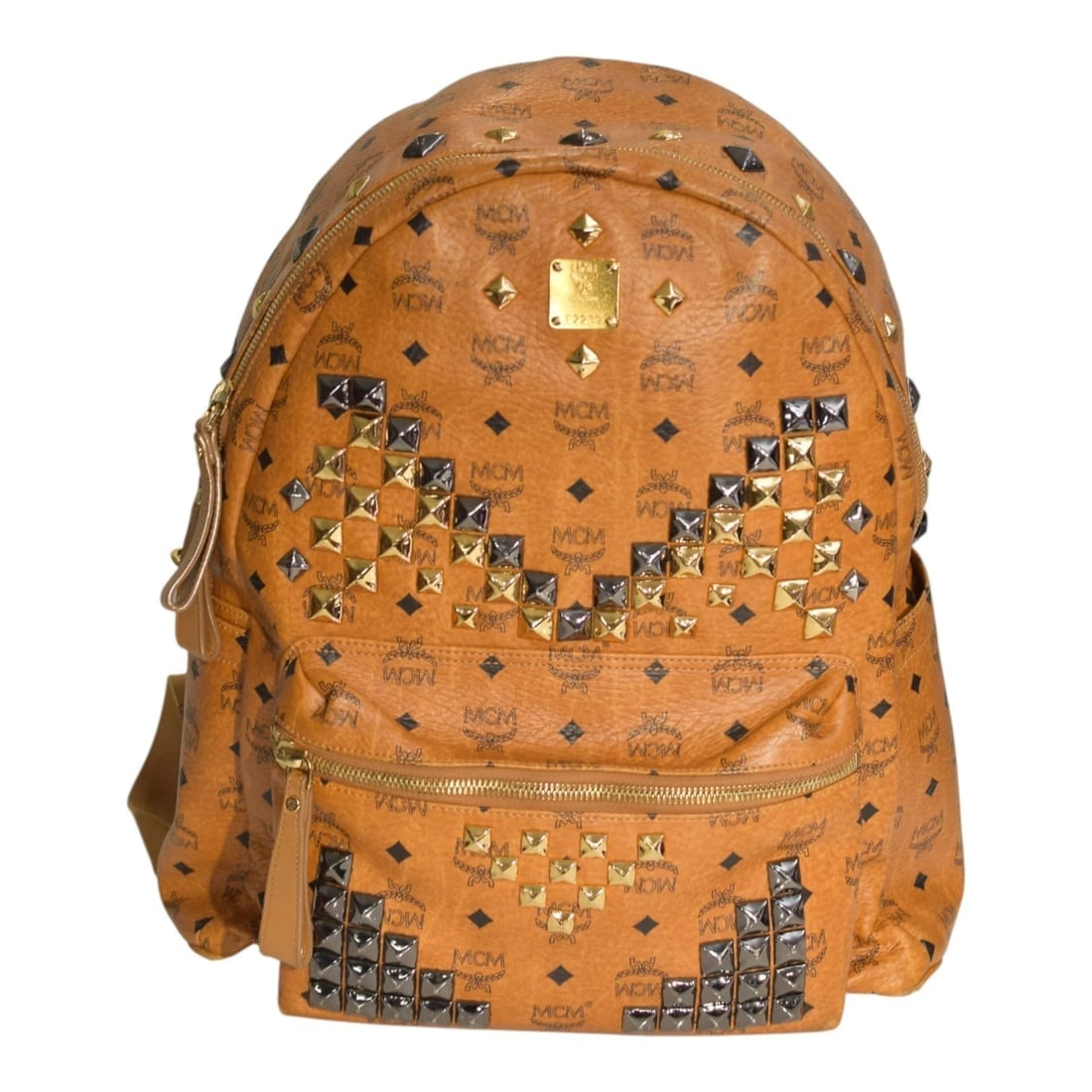 MCM Visetos Studded Backpack Cognac Brown Leather Logo Backpack Large Size: Title:MCM Visetos Studded Backpack Cognac Brown Leather Logo Backpack Large SizeDescription:MCM Visetos Studded Backpack Cognac Brown Leather Logo Backpack Large Size This authentic MCM backpack is