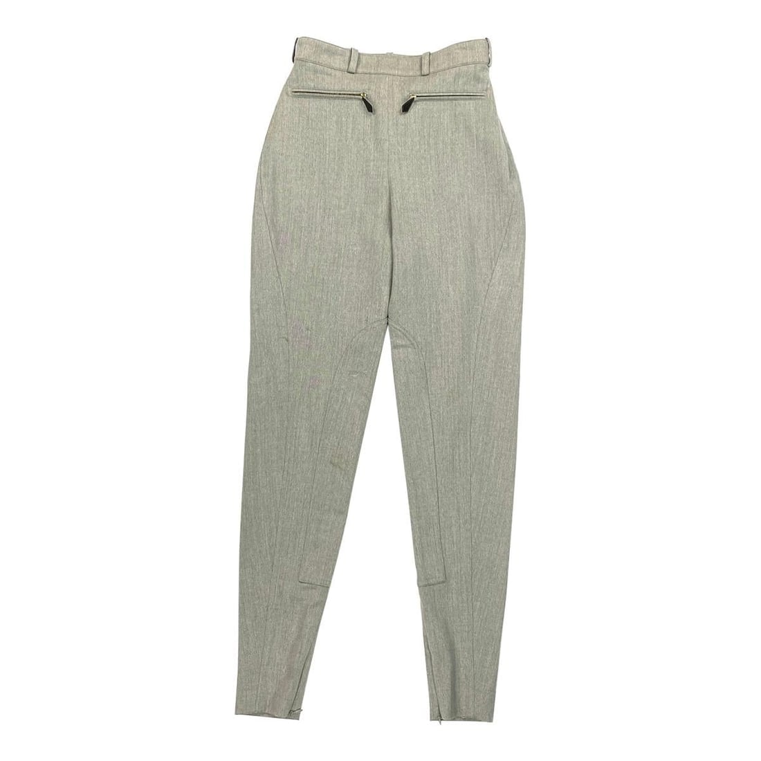 Vintage Hermes Grey Wool Riding Skinny Leggings Pants Size 38: Product details: Size FR 38 High waisted with small belt loops at the waist Two buttons engraved with the Hermes logo on the left side with a side zipper Two zippers with leather zipper pulls. Patch o