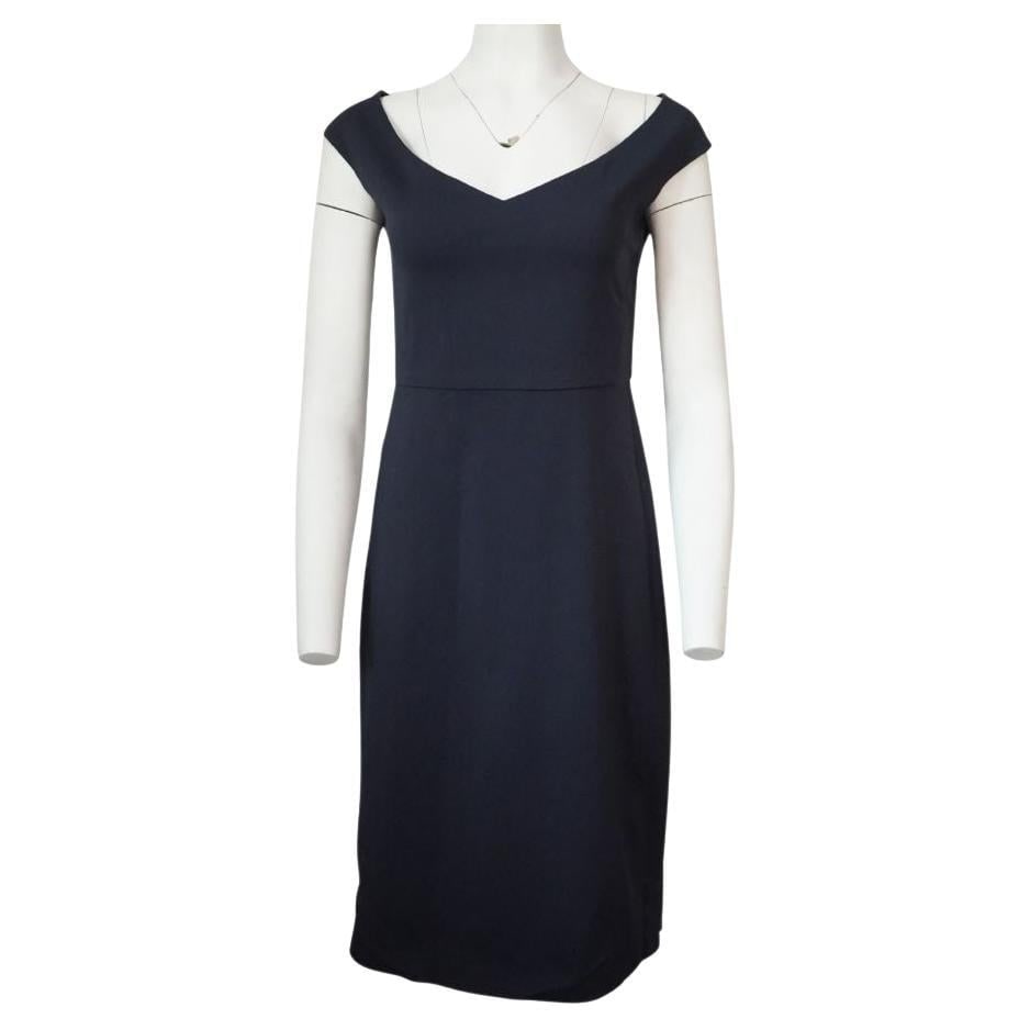 Peter Cohen Navy Midi Dress, Size Medium: The midi dress features v neck line, and off shoulder detail. 94% cotton 6% Great condition Reserve: $600.00 Shipping:Domestic: Flat-rate of $85.99 to anywhere within the contiguous