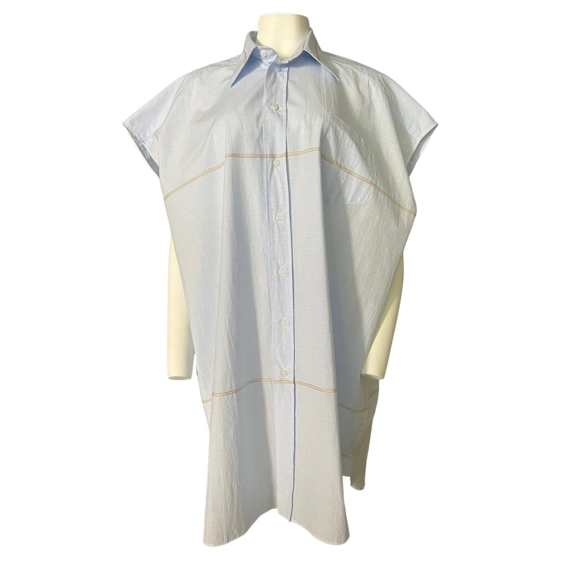 Maison Margiela Light Blue Button Down Dress, Size XS: Collar detail Button down closure Side pocket Striped design detail Mid length Oversized fit Reserve: $520.00 Shipping:Domestic: Flat-rate of $85.99 to anywhere within the contiguous